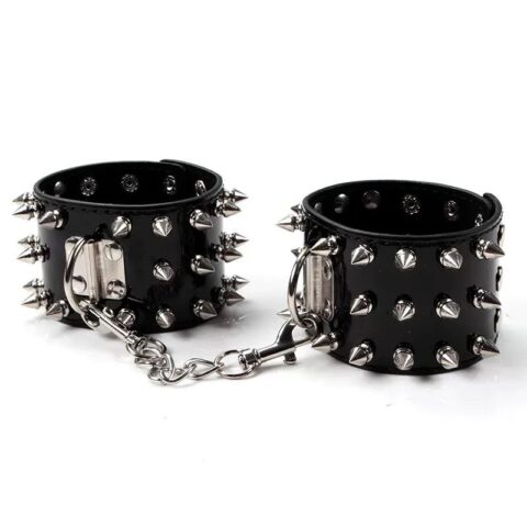 Handcuffs with nails