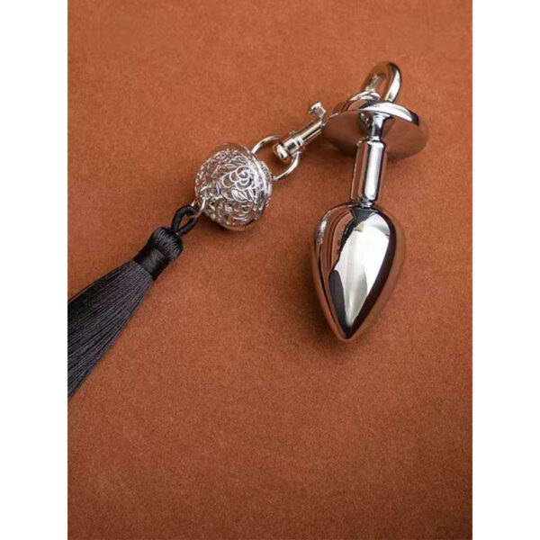 Anal plug with handcuffs